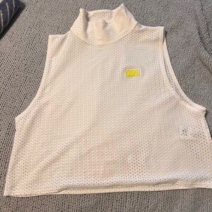 Zumba Fitness White Sleeveless Tank with Zumba logo on back of shirt mesh materi